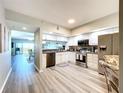 Modern kitchen with stainless steel appliances at 6450 Shoreline Dr # 9203, St Petersburg, FL 33708
