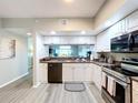 Modern kitchen with stainless steel appliances at 6450 Shoreline Dr # 9203, St Petersburg, FL 33708