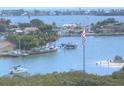 Aerial view of waterfront homes and boats at 100 Bluff View Dr # 415A, Belleair Bluffs, FL 33770