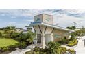 Modern clubhouse with stone facade and landscaping at 12404 52Th E St, Parrish, FL 34219