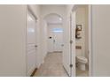 Small half bathroom with toilet and pedestal sink at 2920 Evergreen Elm Pass, Wesley Chapel, FL 33543