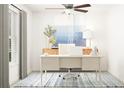 Bright home office features a desk, chair, and stylish decor at 3770 Capital Reserve Dr, Plant City, FL 33565