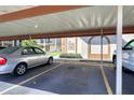 Covered parking area with assigned parking spots at 19029 Us Highway 19 N # 3-13, Clearwater, FL 33764