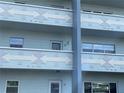 Close-up of South Seas condo building showing architectural details and balconies at 2255 Philippine Dr # 35, Clearwater, FL 33763