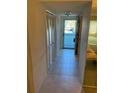 Condo entryway with tile flooring and mirrored wall at 2255 Philippine Dr # 35, Clearwater, FL 33763