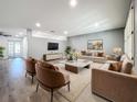 Spacious living room featuring light neutral tones and modern furniture at 5529 11Th N Ave, St Petersburg, FL 33710