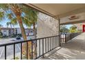 Condo hallway with access to parking and other units at 2750 E Bay Dr # 15E, Largo, FL 33771