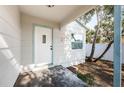 White front door entryway with a small porch at 601 Paris S Ave, St Petersburg, FL 33701