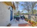 Private patio with seating area, grill, and lush greenery at 6262 142Nd N Ave # 505, Clearwater, FL 33760