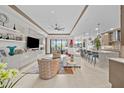 Open living space featuring a modern kitchen and ample natural light at 17702 Cresswind Ter, Bradenton, FL 34211