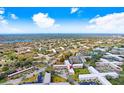 Aerial view of condo building and surrounding area at 2434 Australia E Way # 42, Clearwater, FL 33763