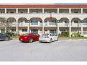Condo building entry with parking at 2434 Australia E Way # 42, Clearwater, FL 33763