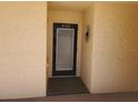 Condo building entrance with security door at 12300 Vonn Rd # 6103, Largo, FL 33774