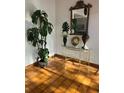 Lobby with tiled floor, plants, and console table at 2593 Countryside Blvd # 7213, Clearwater, FL 33761