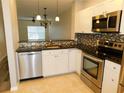 Modern kitchen with stainless steel appliances at 262 Countryside Key Blvd, Oldsmar, FL 34677