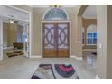 Bright and spacious entryway with double doors and tile floor at 5264 61St S Ave, St Petersburg, FL 33715