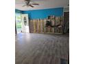 Under renovation living room with new wood-look floors at 6606 Sierra Ter, New Port Richey, FL 34652