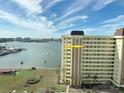 Building exterior showcasing waterfront location and desirable features at 4525 Cove Cir # 1002, St Petersburg, FL 33708