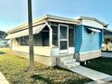 Mobile home with screened porch and stone base at 9790 66Th N St # 330, Pinellas Park, FL 33782