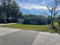 Ranch style home with carport and mature trees at 2508 50Th N Ave, St Petersburg, FL 33714