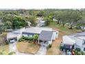 Aerial shot showing house, yard, and community at 2559 Forest Run Ct, Clearwater, FL 33761