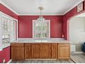 Kitchen with wood cabinets and a marble countertop at 2201 30Th N Ave, St Petersburg, FL 33713