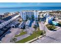 Stunning aerial view of this beachfront condo with garages and beautiful beaches at 17980 Gulf Blvd # 103, Redington Shores, FL 33708