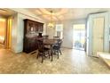 Comfortable dining room with a hutch for extra storage at 225 N Saint Thomas Cir, Apollo Beach, FL 33572