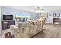 Comfortable living space with water views and sliding glass doors at 18610 Gulf Blvd # 108, Indian Shores, FL 33785