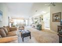 Open concept living and dining area with neutral decor and lots of light at 8015 Willow Brook Dr, Spring Hill, FL 34606