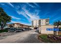 Building exterior, parking lot, and landscaping at 6145 Sun Blvd # 607, St Petersburg, FL 33715
