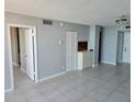 This versatile living area showcases neutral paint, tile flooring, and convenient built-in storage at 6145 Sun Blvd # 607, St Petersburg, FL 33715