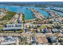 Wide aerial showcasing neighborhood near waterway at 822 Gulf Blvd # 4-6, Indian Rocks Beach, FL 33785