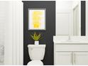 Modern bathroom with white vanity, dark gray walls, and white subway tile at 8337 Bella Mar Trl, Parrish, FL 34219