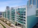 Modern condo building with multiple balconies offers city living with access to outdoor spaces at 912 Channelside Dr # 2601, Tampa, FL 33602