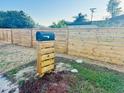 Modern mailbox with wood fence and landscaping at 1019 Landau St, Holiday, FL 34690