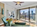 Bright living room with floor-to-ceiling windows and a view of the city skyline at 226 5Th N Ave # 1502, St Petersburg, FL 33701