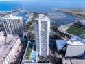 Stunning aerial view showcases the luxurious high-rise condo, marina, stadium, and city skyline at 175 1St S St # 3402, St Petersburg, FL 33701