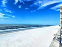 Expansive ocean view from the condominium building on a bright sunny day, offering a serene beachside lifestyle at 18650 Gulf Blvd # 413, Indian Shores, FL 33785