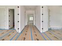 Bright hallway with white trim and doors, showcasing the home's clean and modern design at 100 37Th Ne Ave, St Petersburg, FL 33704