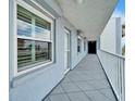 Balcony view of a unit featuring neutral paint, and outdoor seating at 18325 Gulf Blvd # 407, Redington Shores, FL 33708