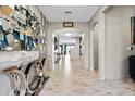 Elegant foyer features high ceilings, tile floors, and ornate decorative art at 12854 Boggy Creek Dr, Riverview, FL 33579
