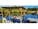 Covered dock with built in sink and waterway view at 14928 Capri Ln, Hudson, FL 34667