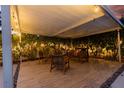 Relaxing covered patio with comfortable seating, perfect for outdoor entertaining at 3611 W De Leon St, Tampa, FL 33609