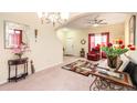 Spacious living room with a view of the staircase, large area rug, and comfortable seating arrangement at 534 19Th Nw St, Ruskin, FL 33570