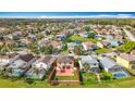 Aerial view of a home in a residential area, showcasing the property's lot size and community setting at 27500 Breakers Dr, Wesley Chapel, FL 33544