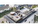 Inviting rooftop patio with lounge seating, a hot tub, a fire pit and views of the neighborhood at 18077 3Rd St, Redington Shores, FL 33708