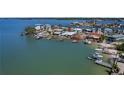 Waterfront home offers boat access with a dock to enjoy the scenic views at 16108 5Th E St, Redington Beach, FL 33708