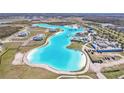 Aerial view of lagoon and nearby community at 31814 Oyster Trellis Ln, Wesley Chapel, FL 33545