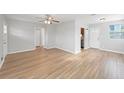 Bright and airy living room with modern hardwood flooring and neutral paint at 3030 5Th N Ave, St Petersburg, FL 33713
